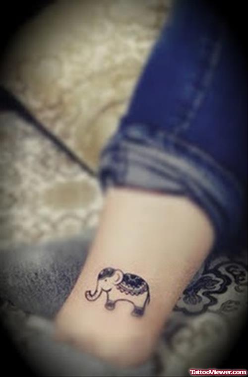 Small Indian Elephant Tattoo On Leg
