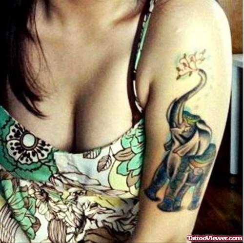 Grey Ink Elephant Tattoo On Girl Left Bicep