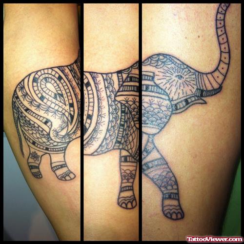 Grey Ink Elephant Tattoo On Biceps