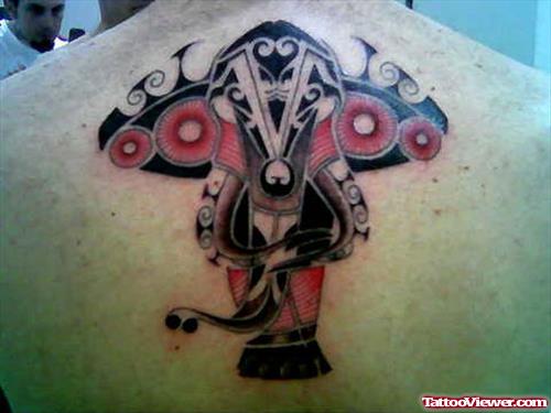 Colored Elephant Tattoo On Upperback