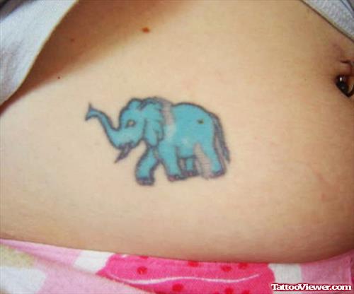 Blue Ink Elephant Tattoo On Hip