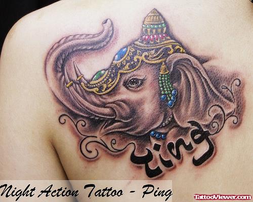 Arabic And Elephant Head Tattoo
