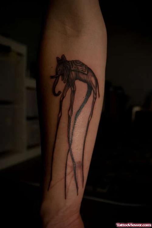Salvador Dali Elephant Tattoo On Arm