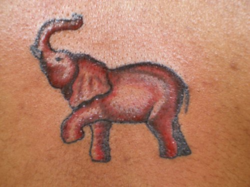 Brown Ink Elephant Tattoo