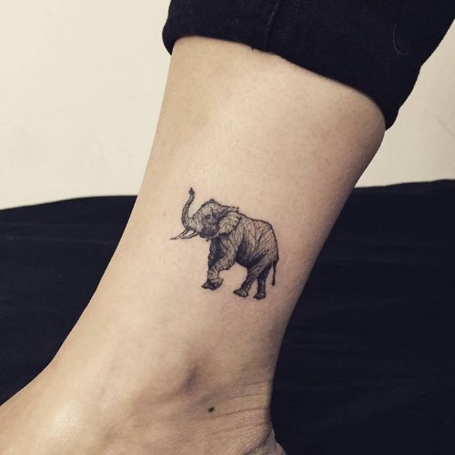 Grey Ink Small Elephant Tattoo