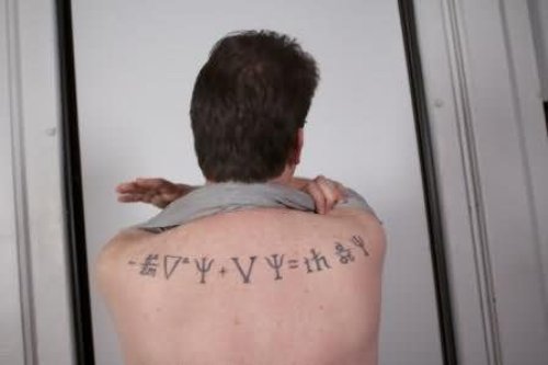 Man Showing His Equation Tattoo