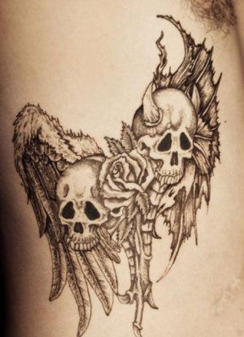Grey Ink Evil Skulls And Flower Tattoo