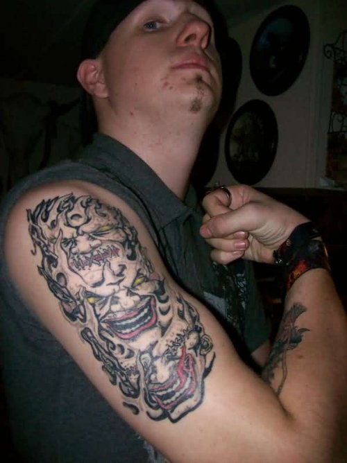 Right Shoulder Evil Skulls Tattoo