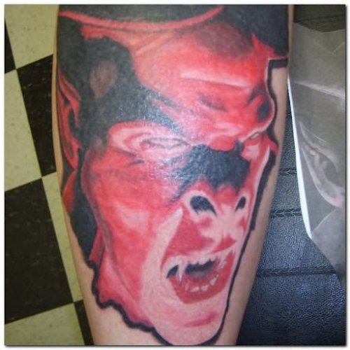 Red Ink Evil Tattoo