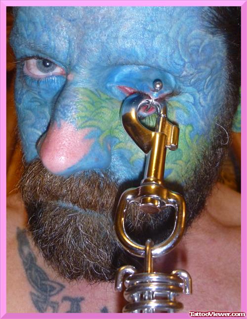 Extreme Piercing And Face Tattoo