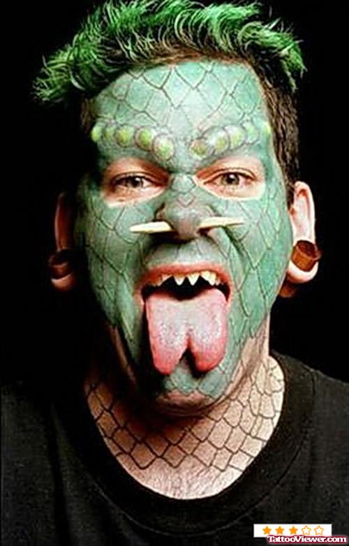 Extreme Snake Skin Tattoo On Face
