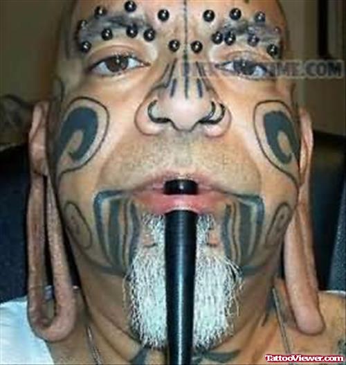 Extreme Face Tattoo And Extreme Piercings