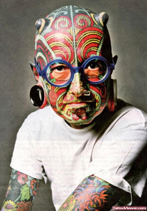 Extreme Colored Tattoo On Face