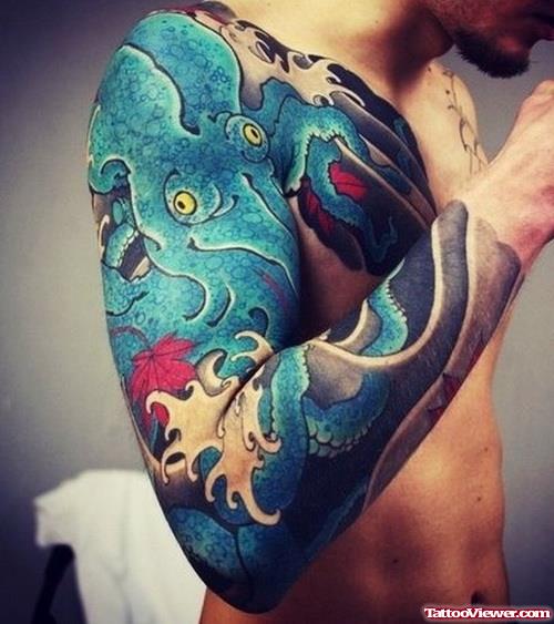 Blue Octopus Tattoo On Right Sleeve