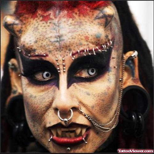 ExtremVampie Girl Face Tattoo