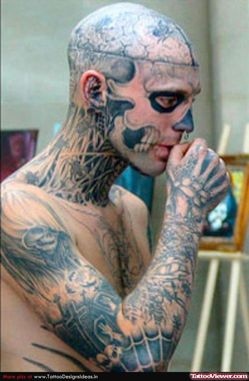 Extreme Skeleton Tattoo On Face And Sleeve