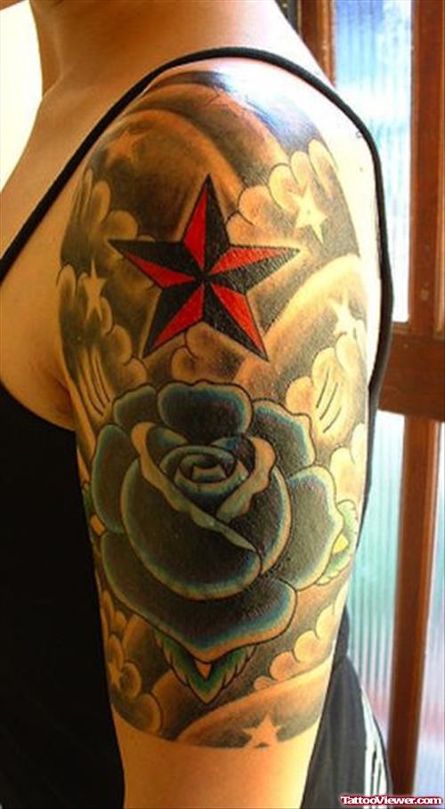Blue Rose And Red Nautical Star Tattoo On Half Sleeve