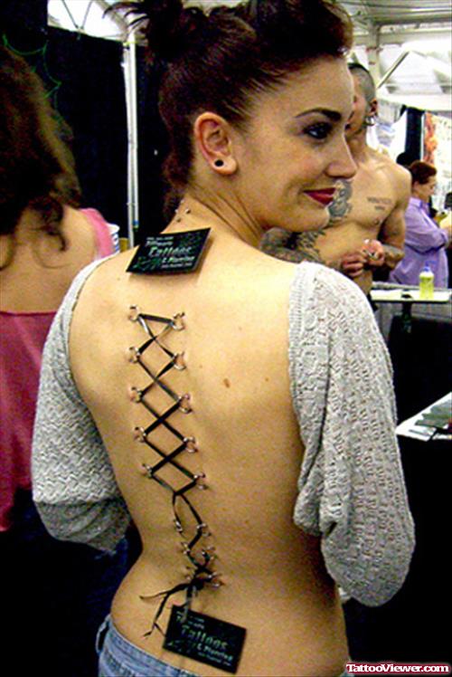 Extreme Corset tattoo On Back