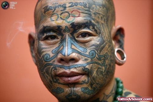 Nice Extreme Tribal Tattoo On Face