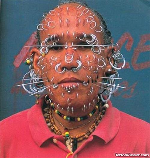 Extreme Tattoo And Piercings On Face