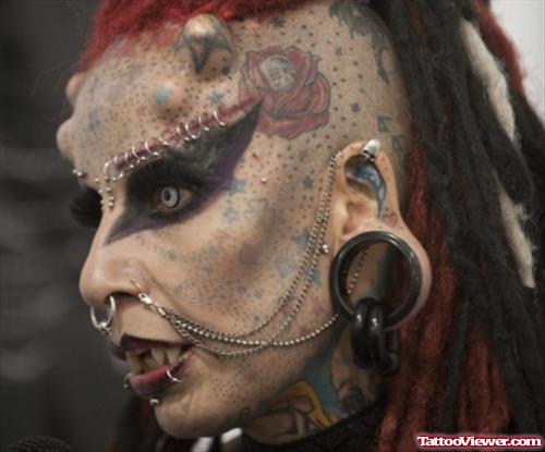 Extreme Guirl Vampire Face Tattoo