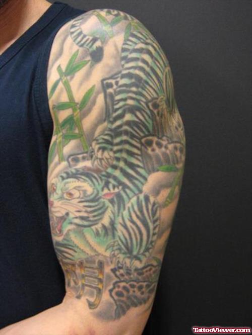 Extreme Tiger Tattoo On Man Left Half Sleeve