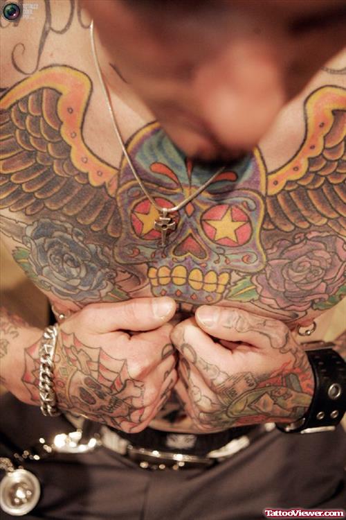 Extreme Winged Skull Tattoo On Man Chest