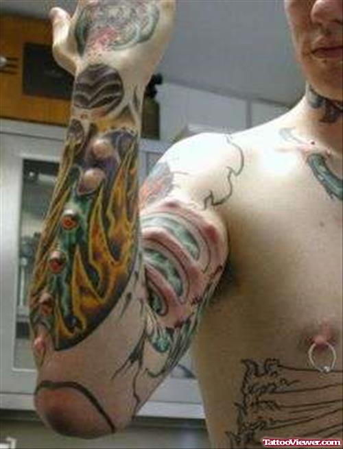 Extreme Tattoo On Right Sleeve