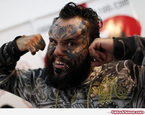 Extreme Man Face Tattoo