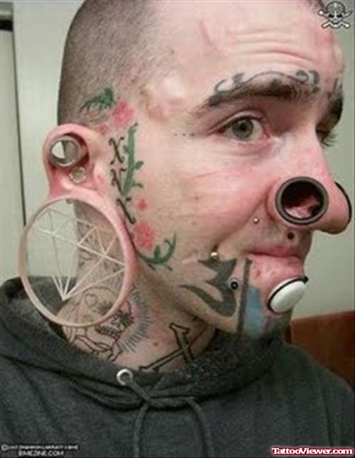 Awesome Extreme Tattoo On Man Face