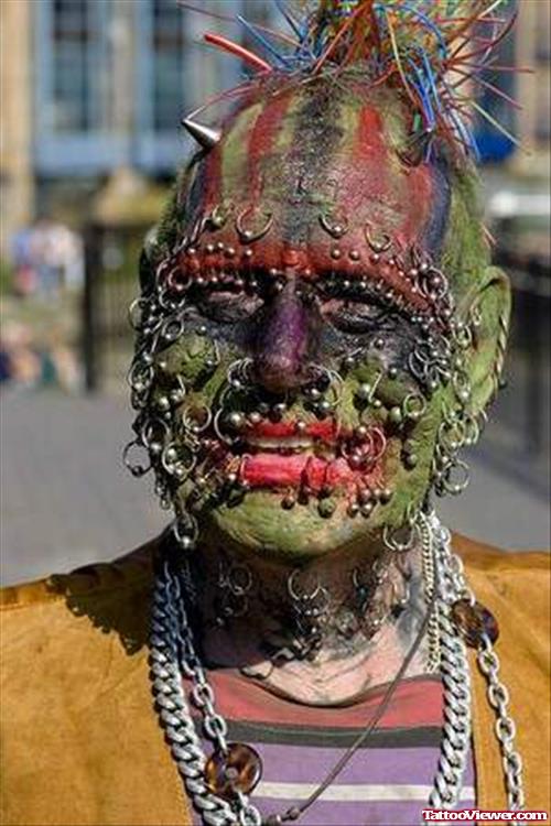 Extreme Colored Face Tattoo