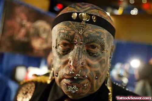 Extreme Black Ink Face Tattoo