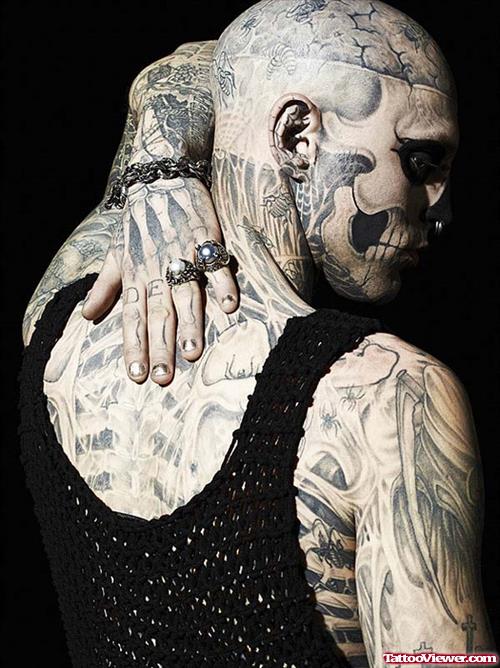 Extreme Skull Tattoo On Man Face