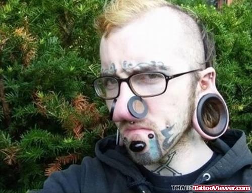 Extreme Face Tattoo And Piercings