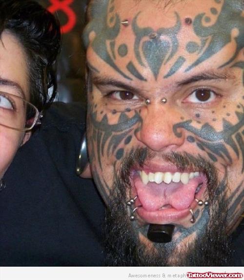 Crazy Black Tribal Extreme Tattoo On Face