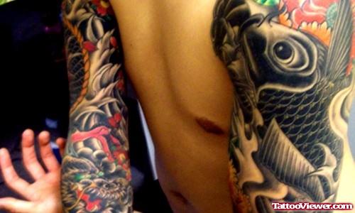 Extreme Koi Tattoo On Man Both Sleeves
