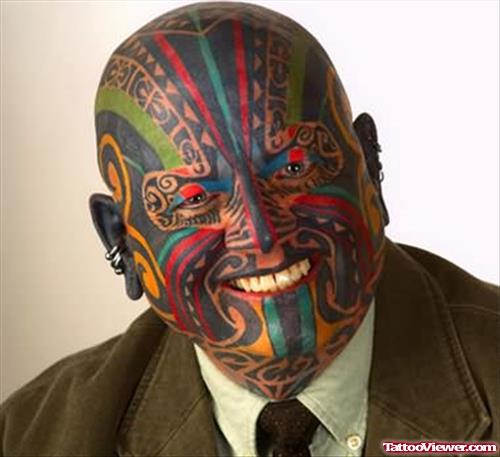 Extreme Colourful Tattoo On Face