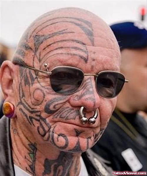 Celtic Face Tattoo & Piercing