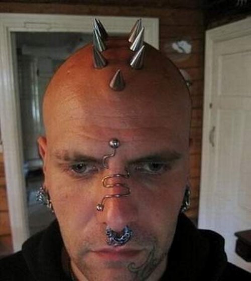 Attractive Extreme Piercing And Tattoo On Face