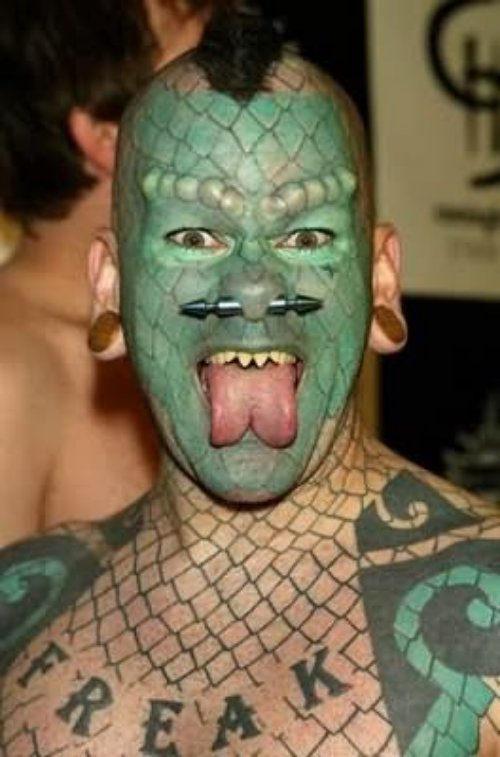 Extreme Green Tattoo On Face