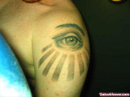 Glowing Eyes Tattoo On Shoulder