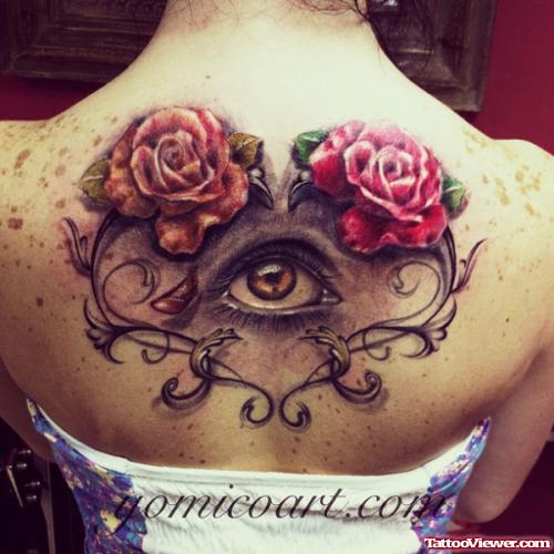 Colored Flowers and Eye Tattoo On Upperback
