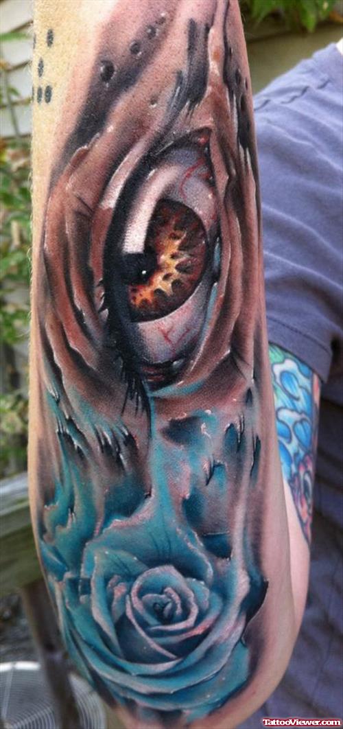 Blue Rose And Eye Tattoo On Sleeve
