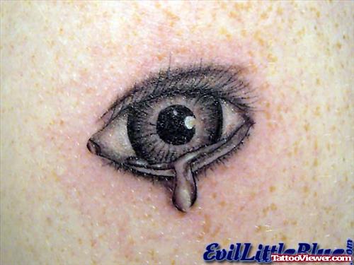 Beautiful Grey Ink Crying Eye Tattoo