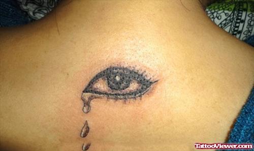 Weeping Eye Tattoo With Tears On Upperback