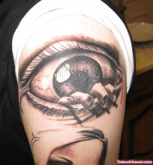 Grey Ink Eye With Fingers Tattoo On Left Half Sleeve