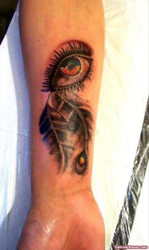 Feathers And Eye Tattoo On Forearm