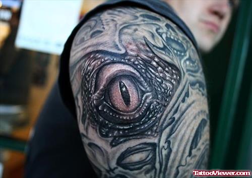 Attractive Biomechanical Eye Tattoo On Man Right Shoulder