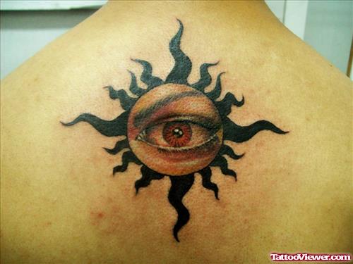 Tribal Sun And Eye Tattoo On Upperback