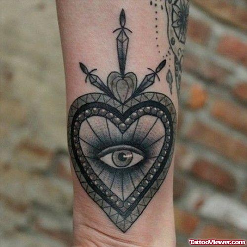 Heart Eye Tattoo On Wrist